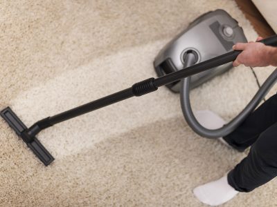 Close up of vacuuming a carpet
